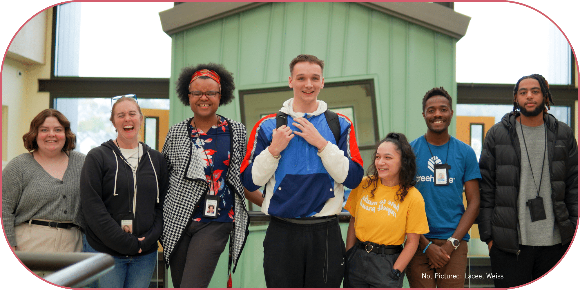 Image of the Treehouse fellows in front of the Treehouse at the Treehouse offices