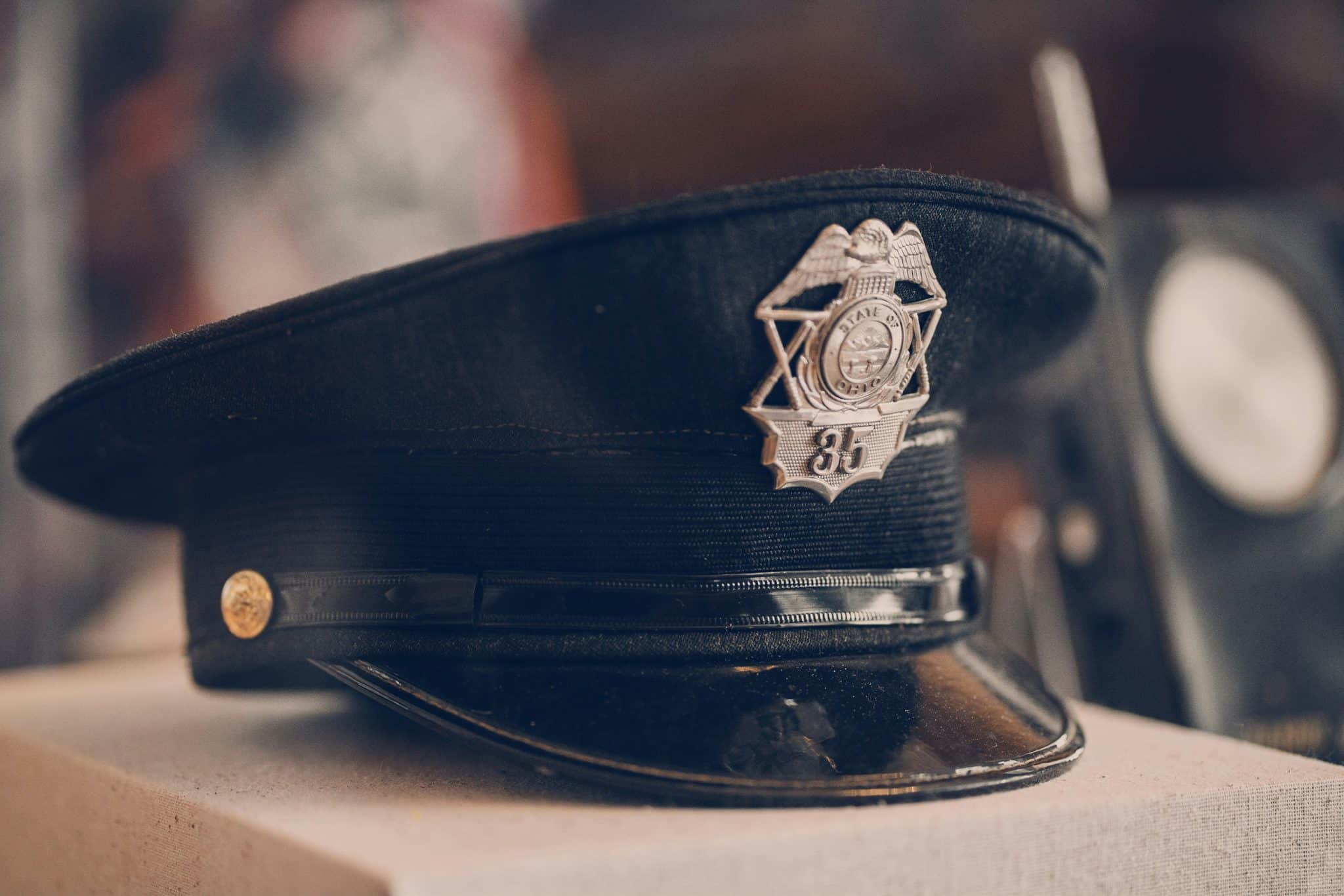 Police officer hat on top of a box