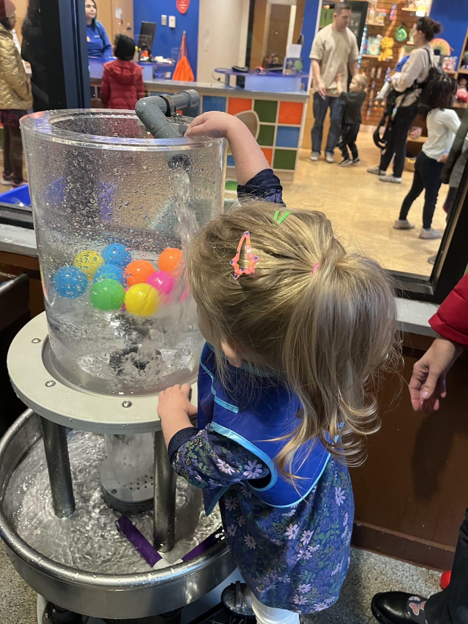 Treehouse participant enjoys play at a children's museum